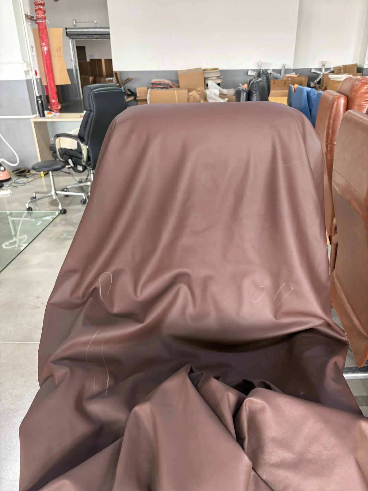 Load video: Explore our extensive collection of full-grain and top-grain leathers — sourced, inspected, and ready for your custom order.