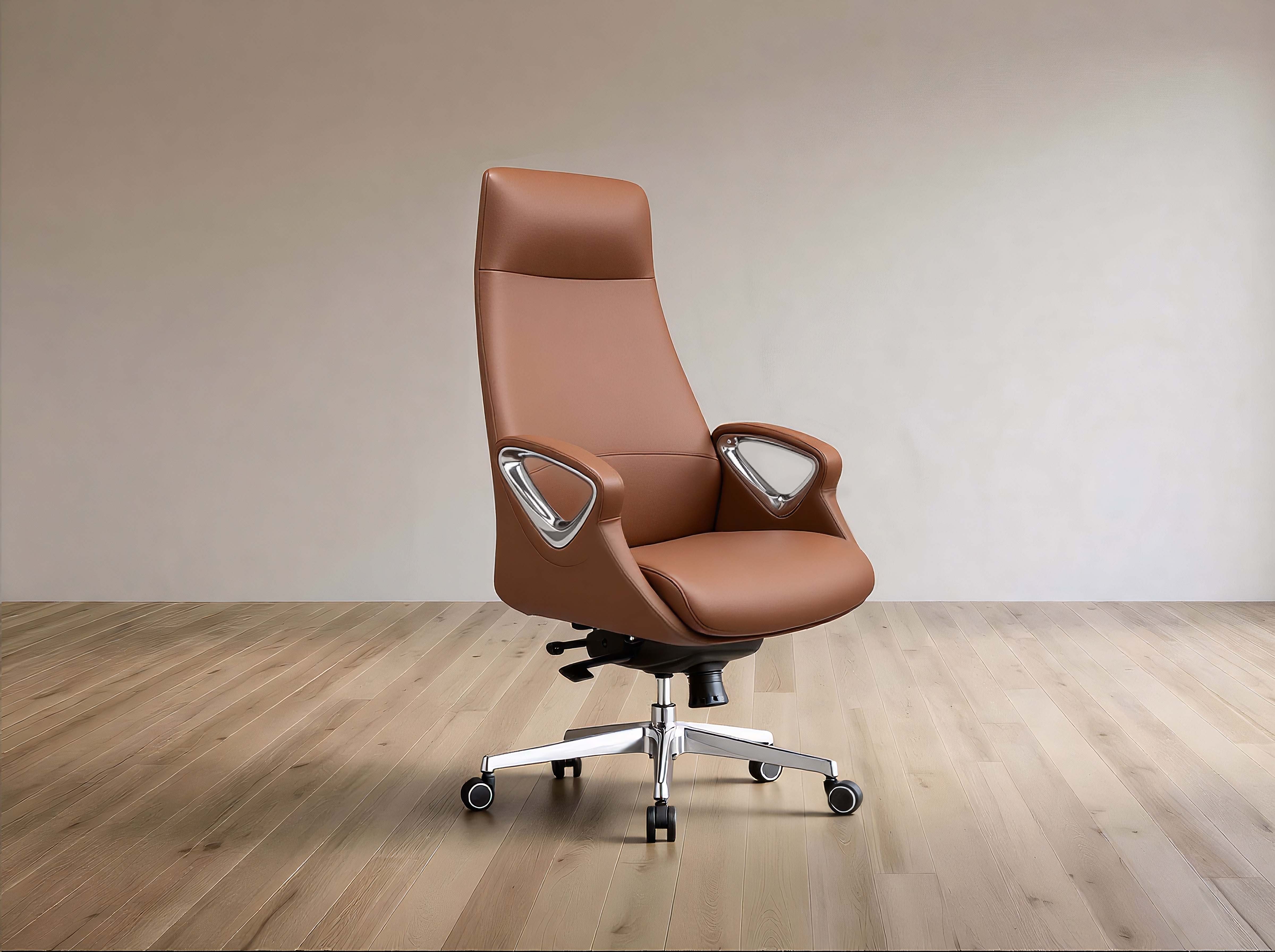 A brown leather high-back office chair with silver armrest supports and a chrome five-star wheeled base, set against a minimalist beige wall and light wood floor.