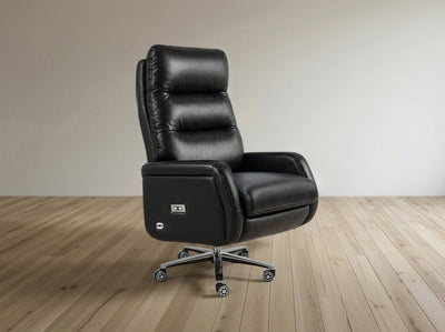 Black leather office chair on a wooden floor with a plain wall background
