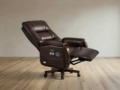A dark brown leather recliner office chair with the footrest extended, set against a neutral beige wall and light wood floor.