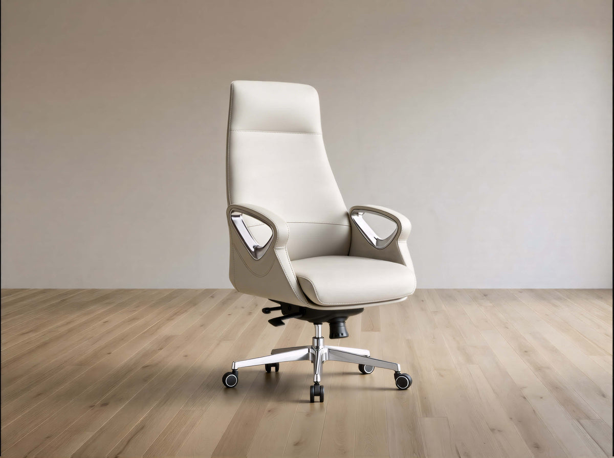 A modern high-back office chair upholstered in light beige leather, featuring chrome armrests and a five-star metal base with casters, set against a minimalist beige wall and light wood floor.